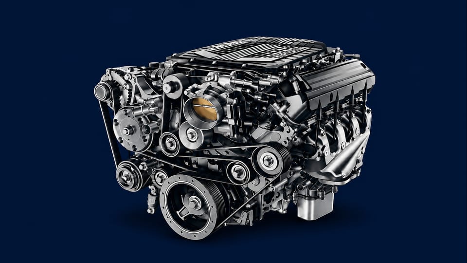 Complete automotive engine assembly for ERMAK Tires engine replacement service.